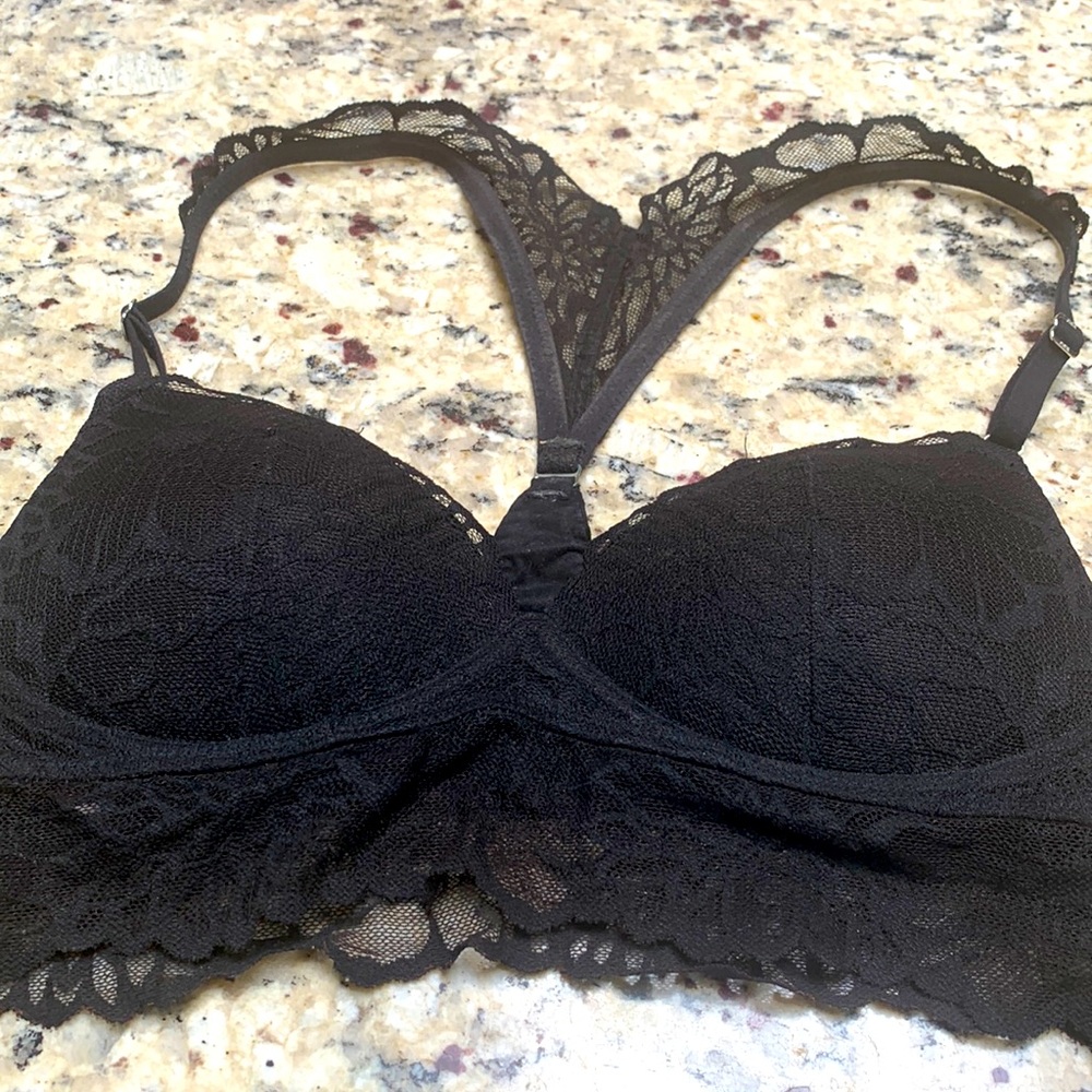 Pink, bra with padded bra area, black, pre owned.